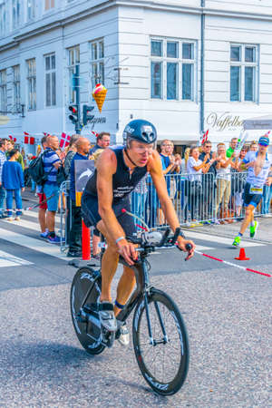 COPENHAGEN, DENMARK, AUGUST 21, 2016: Detail of an athlete participating at the 2016 KMD Ironman triatlon competition in Copenhagen.のeditorial素材