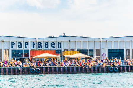 COPENHAGEN, DENMARK, AUGUST 21, 2016: Copenhagen Street Food Market Papiroen and the opera house.のeditorial素材