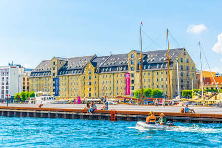 COPENHAGEN, DENMARK, AUGUST 21, 2016: View of a promenade leading alongside the channel in central Copenhagen, Denmark.のeditorial素材