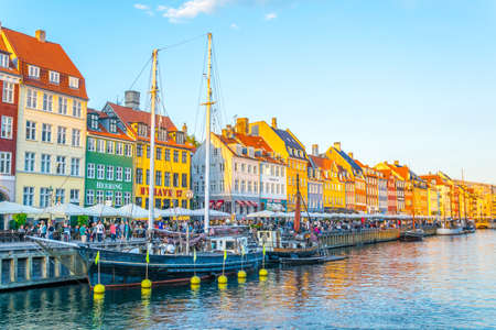 COPENHAGEN, DENMARK, AUGUST 21, 2016: Sunset view of old Nyhavn port in the central Copenhagen, Denmark.のeditorial素材