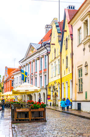TALLIN, ESTONIA, AUGUST 16, 2016: People are walking through a colorful street in the old town of Tallin, Estonia.のeditorial素材