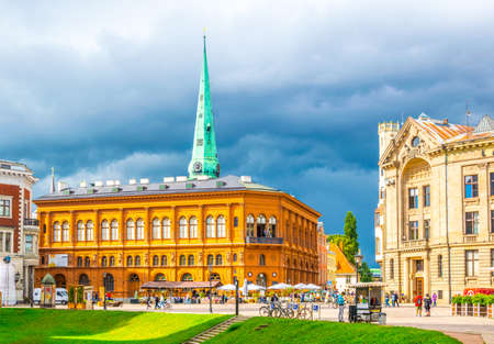 RIGA, LATVIA, AUGUST 15, 2016: People are walking in front of the Latvijas Radio - Latvia's radio broadcasting office in Riga, Latviaのeditorial素材