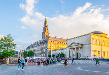 COPENHAGEN, DENMARK, AUGUST 21, 2016: People are strolling in front of the Christiansborg Slot Palace in Copenhagen, Denmarkのeditorial素材