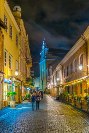 VILNIUS, LITHUANIA, AUGUST 14, 2016: Night view of the Pilies gatve which is the main tourist street in Vilnius, Lithuaniaのeditorial素材