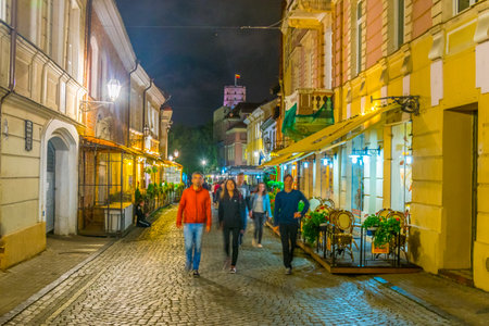 VILNIUS, LITHUANIA, AUGUST 14, 2016: Night view of the Pilies gatve which is the main tourist street in Vilnius, Lithuaniaのeditorial素材