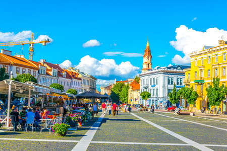 VILNIUS, LITHUANIA, AUGUST 14, 2016: People are strolling through Rotuses aikste - the town hall square of the lithuanian capital Vilnius, Lithuaniaのeditorial素材