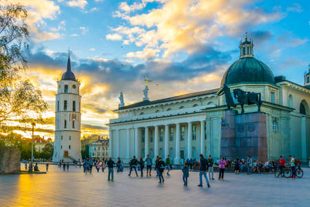 VILNIUS, LITHUANIA, AUGUST 14, 2016: People are walking in front of the Saint Stanislaus cathedral in the lithuanian capital vilnius during sunset.のeditorial素材