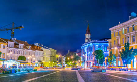 VILNIUS, LITHUANIA, AUGUST 14, 2016: Night view of People strolling through Rotuses aikste - the town hall square of the lithuanian capital Vilnius, Lithuaniaのeditorial素材