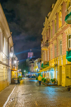 VILNIUS, LITHUANIA, AUGUST 14, 2016: Night view of the Pilies gatve which is the main tourist street in Vilnius, Lithuaniaのeditorial素材