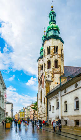 KRAKOW, POLAND, AUGUST 11, 2016: People are walking through Grodzka street towards the saint Andrew church in Krakow / Cracow, Poland.のeditorial素材