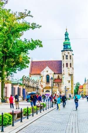 KRAKOW, POLAND, AUGUST 11, 2016: People are walking through Grodzka street towards the saint Andrew church in Krakow / Cracow, Poland.のeditorial素材