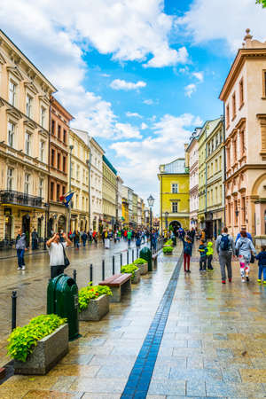 KRAKOW, POLAND, AUGUST 11, 2016: People are walking through Grodzka street in Krakow / Cracow, Poland.のeditorial素材