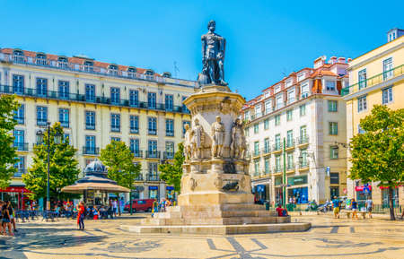 LISBON, PORTUGAL, SEPTEMBER 4, 2016: People are passing through Luis de Camoes square in Lisbon, Portugal.のeditorial素材