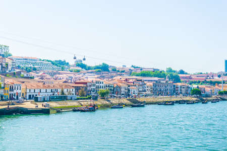 PORTO, PORTUGAL, SEPTEMBER 5, 2016: Aerial view of wine cellars spread along the douro river in Porto, Portugal.のeditorial素材
