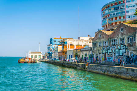 LISBON, PORTUGAL, SEPTEMBER 3, 2016: People are strolling on waterfront in Cacilhas in Lisbon, Portugal.のeditorial素材