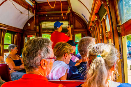 PORTO, PORTUGAL, SEPTEMBER 6, 2016: People inside of a typical tram in Porto, Portugal.のeditorial素材