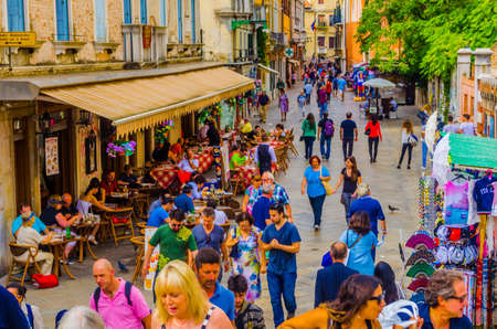 VENICE, ITALY, SEPTEMBER 20, 2015: people are strolling over strada nuova street in italian city venice, which belongs to the main streets of the city.のeditorial素材