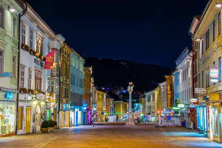 VILLACH, AUSTRIA, FEBRUARY 20, 2016: night view of the illuminated main square - main square with the church of saint jakob in the austrian city villachのeditorial素材