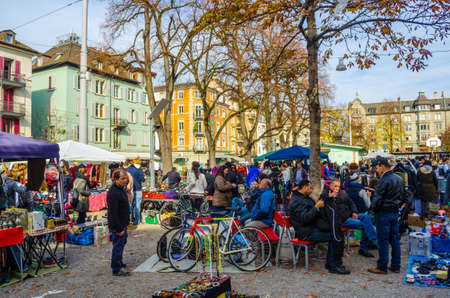 ZURICH, SWITZERLAND, OCTOBER 24, 2015: View of a Saturday flea market in the swiss city zurich where dozens of people are looking for precious artifactsのeditorial素材