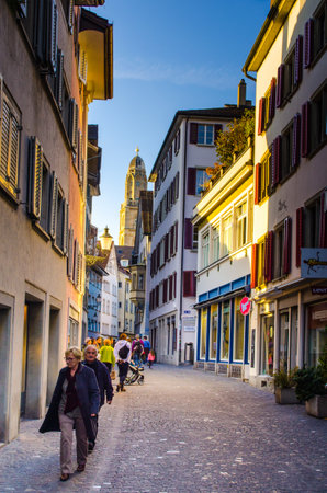 ZURICH, SWITZERLAND, OCTOBER 24, 2015: View of a narrow street winding through the historical center of zurich in switzerlandのeditorial素材