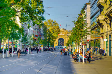 ZURICH, SWITZERLAND, OCTOBER 25, 2015: Traffic and shopping mall on Bahnhofstrasse in Zurich, Switzerland. Bahnhofstrasse is one of the most expensive shopping streets in the world.のeditorial素材