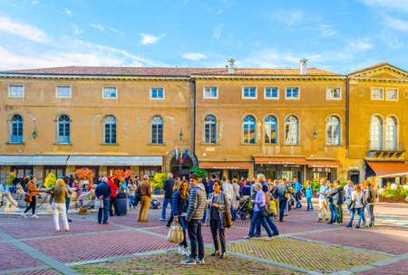 BERGAMO, ITALY, NOVEMBER 2, 2014: People are strolling through Piazza Vecchia in Bergamo, Italyのeditorial素材