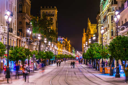 SEVILLA, SPAIN, JANUARY 7, 2016: Night view of the avenida de la constitucion street in the spanish...