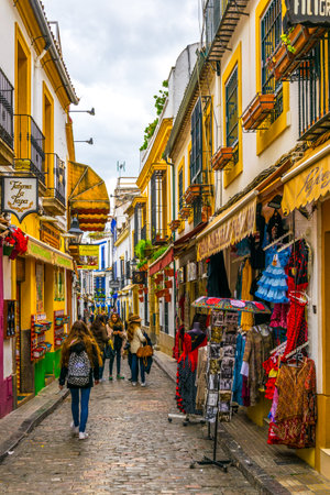 CORDOBA, SPAIN, JANUARY 8, 2016: people are strolling through whitewashed streets of the jewish quarter of the spanish city cordobaのeditorial素材