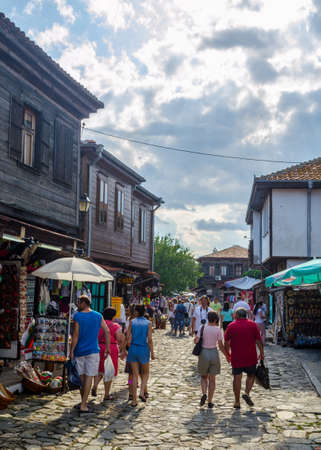 NESEBAR, BULGARIA, JULY 17, 2015: People are strolling during sunny summer day through streets of bulgarian city nesebar which belongs to the unesco world heritage.のeditorial素材