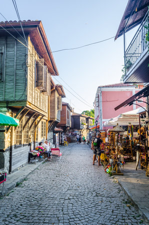 SOZOPOL, BULGARIA, JULY 17, 2015: The streets of the old city resort of Sozopol in Bulgaria are full of tourist during summer. Old town is famous for its distinctive wooden architecture, typical for bulgarian medieval age.のeditorial素材