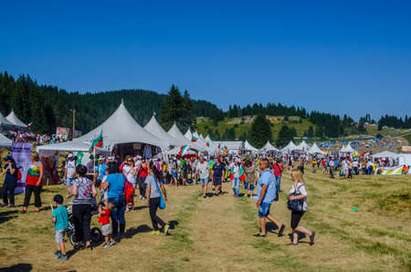 ROZHEN, BULGARIA, JULY 18, 2015: Rozhen folklore festival in Bulgaria. Visitors may see performance focused on traditional dances and music including bagpipes and nestinari walk on fire show.のeditorial素材