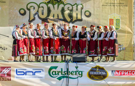 ROZHEN, BULGARIA, JULY 18, 2015: group of elderly bulgarian women is singing traditional songs on a stage of famous rozhen folklore festival in bulgaria.のeditorial素材