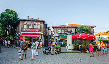 SOZOPOL, BULGARIA, JULY 17, 2015: The streets of the old city resort of Sozopol in Bulgaria are full of tourist during summer. Old town is famous for its distinctive wooden architecture, typical for bulgarian medieval age.のeditorial素材