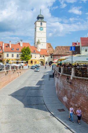 SIBIU, ROMANIA, JULY 6, 2015: View of the Small Square - piata mica, the second fortified square in the medieval Upper town of Sibiu city.のeditorial素材