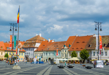 SIBIU, ROMANIA, JULY 6, 2015: View of the Big Square - piata mare, the first fortified square in the medieval Upper town of Sibiu city.のeditorial素材