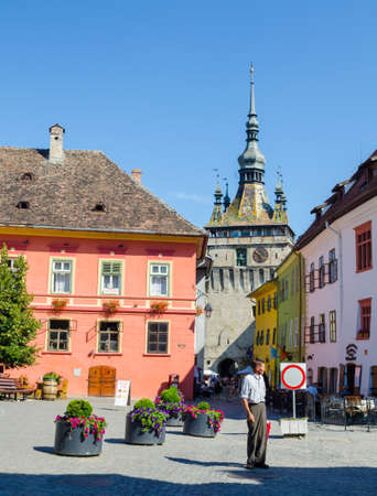 SIGHISOARA, ROMANIA, JULY 9, 2015: View of a street situated in the historical core of medieval city sighisoara in romania.のeditorial素材