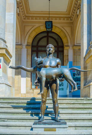BUCHAREST, ROMANIA - SEPTEMBER 2015: The statue of Emperor Trajan and wolf stands outside the National Museum.のeditorial素材