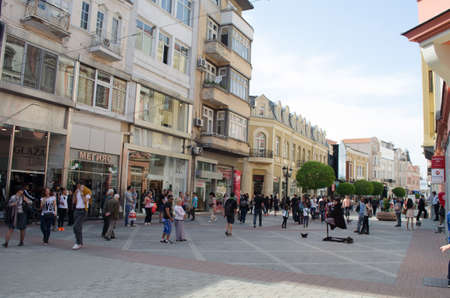PLOVDIV, BULGARIA, APRIL 7, 2015: People are strolling through the main boulevard in center of...