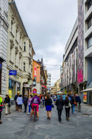 LJUBLJANA, SLOVENIA, JULY 29, 2015: Pedestrians at Copova street in Ljubljana. People walking at pedestrian zone in Ljubljana, Slovenia.のeditorial素材