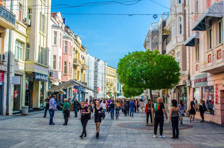 PLOVDIV, BULGARIA, APRIL 7, 2015: People are strolling through the main boulevard in center of...