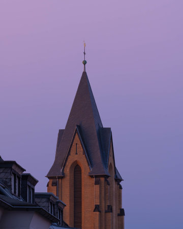Church in Duesseldorf in a purple Light as the sun rises in the late Autumnの写真素材