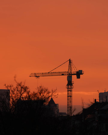 Crane in the fiery Red Sunset of Duesseldorf Germany in November 2025 - City Developement