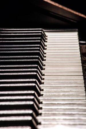 beautiful piano keys against a dark backgroundの写真素材