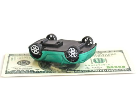 Crash car  on dollarsの写真素材