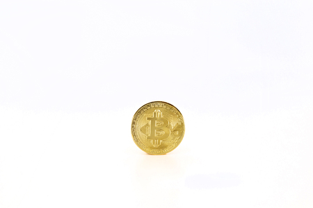 Bitcoin token isolated on white background. Cryptocurrency concept with copy space.の写真素材