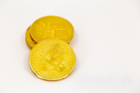 Multiple Bitcoin tokens isolated on white background. Cryptocurrency concept with copy space.