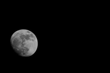 Big Full moon on black night skyの写真素材