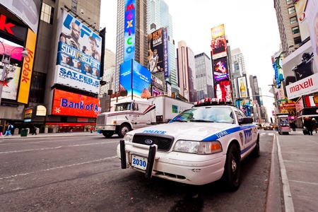 NEW YORK CITY - JAN 6: Empty Times Square in morning with NYPD car in foreground, January 6, 2011 in...