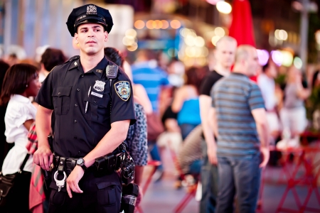 NEW YORK CITY - JULY 2: An unidentified NYPD Police Officer on Times square on July, 2011 in Manhattan, New York City.のeditorial素材