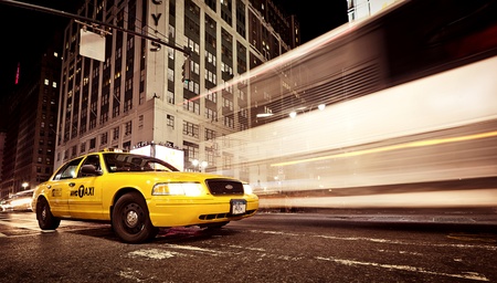 NEW YORK - JULY 2: Standind yellow taxicab in front of world famous department store Macy's on July 2, 2011 in Manhattan, New York, USA. This flagship Macy's store was founded in 1902のeditorial素材